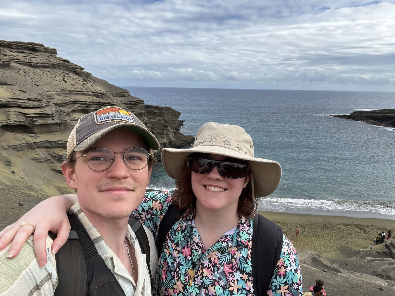 Ian and Nicole at the green sand beach in Hawaii